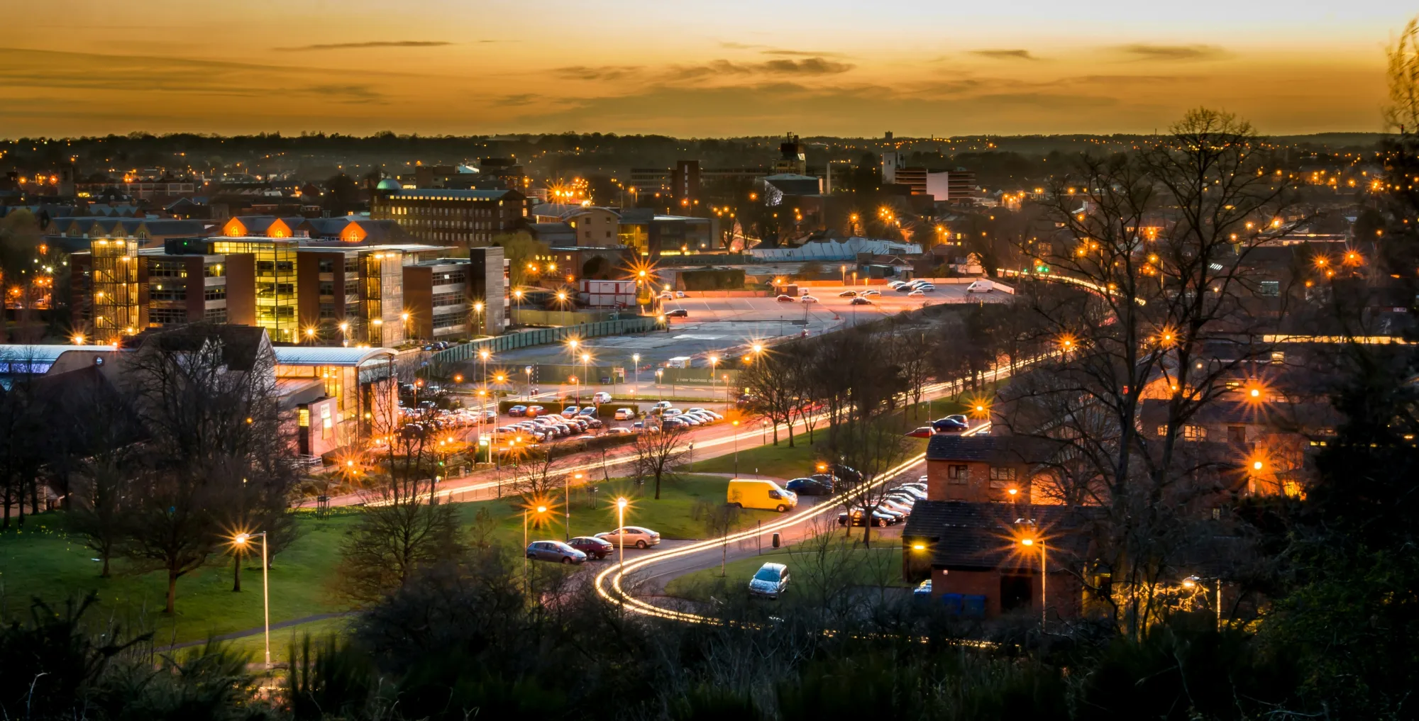 Norwich city skyline illuminated at dusk