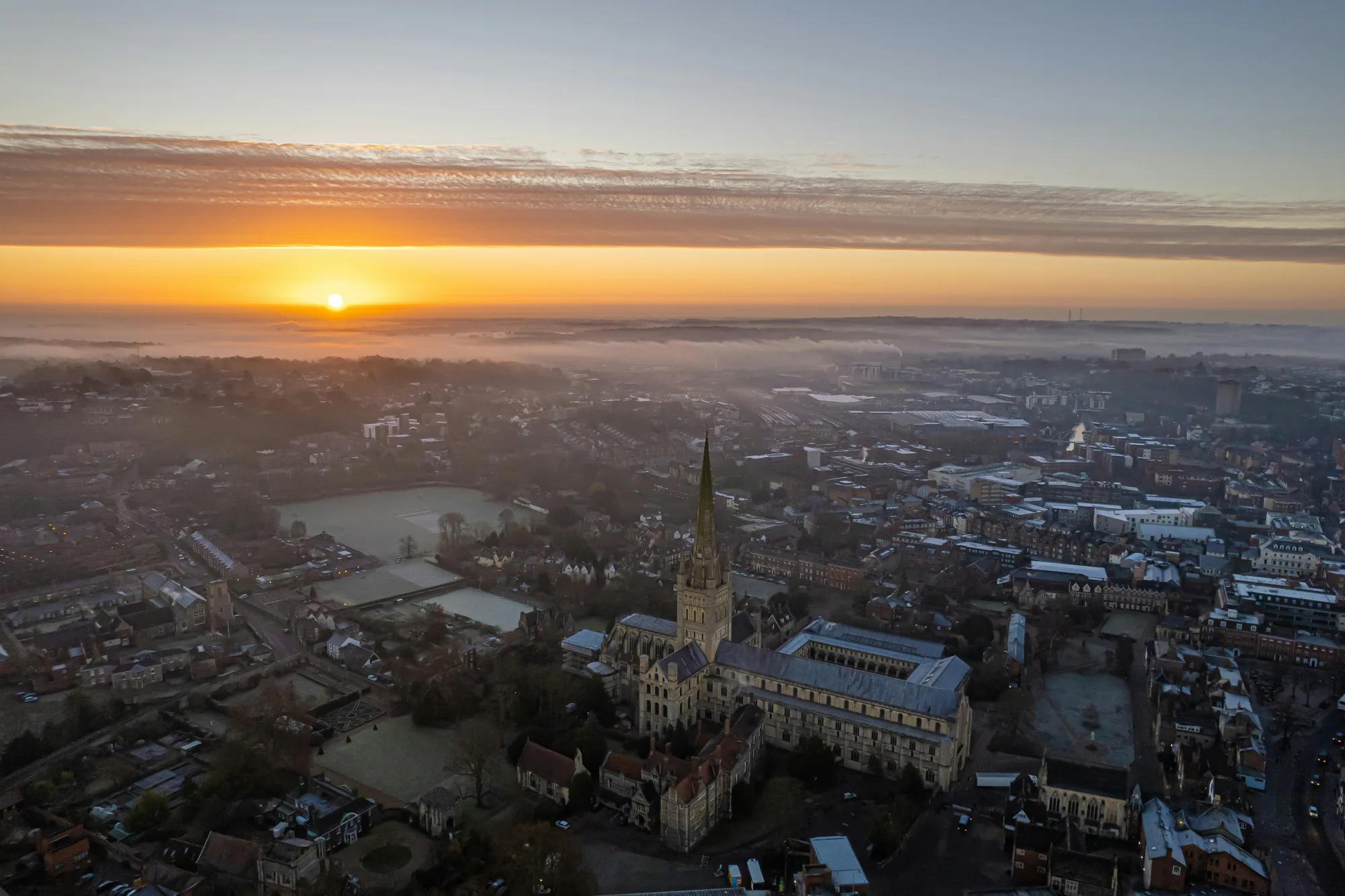 Norwich skyline and cathedral at sunset